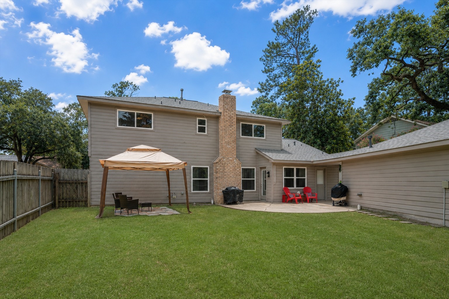 4026 Oxhill Road Spring, TX 77388 - Photo 33 of 40 Whether hosting friends, playing with pets, or enjoying a quiet evening outdoors, this backyard offers room to make it your own.