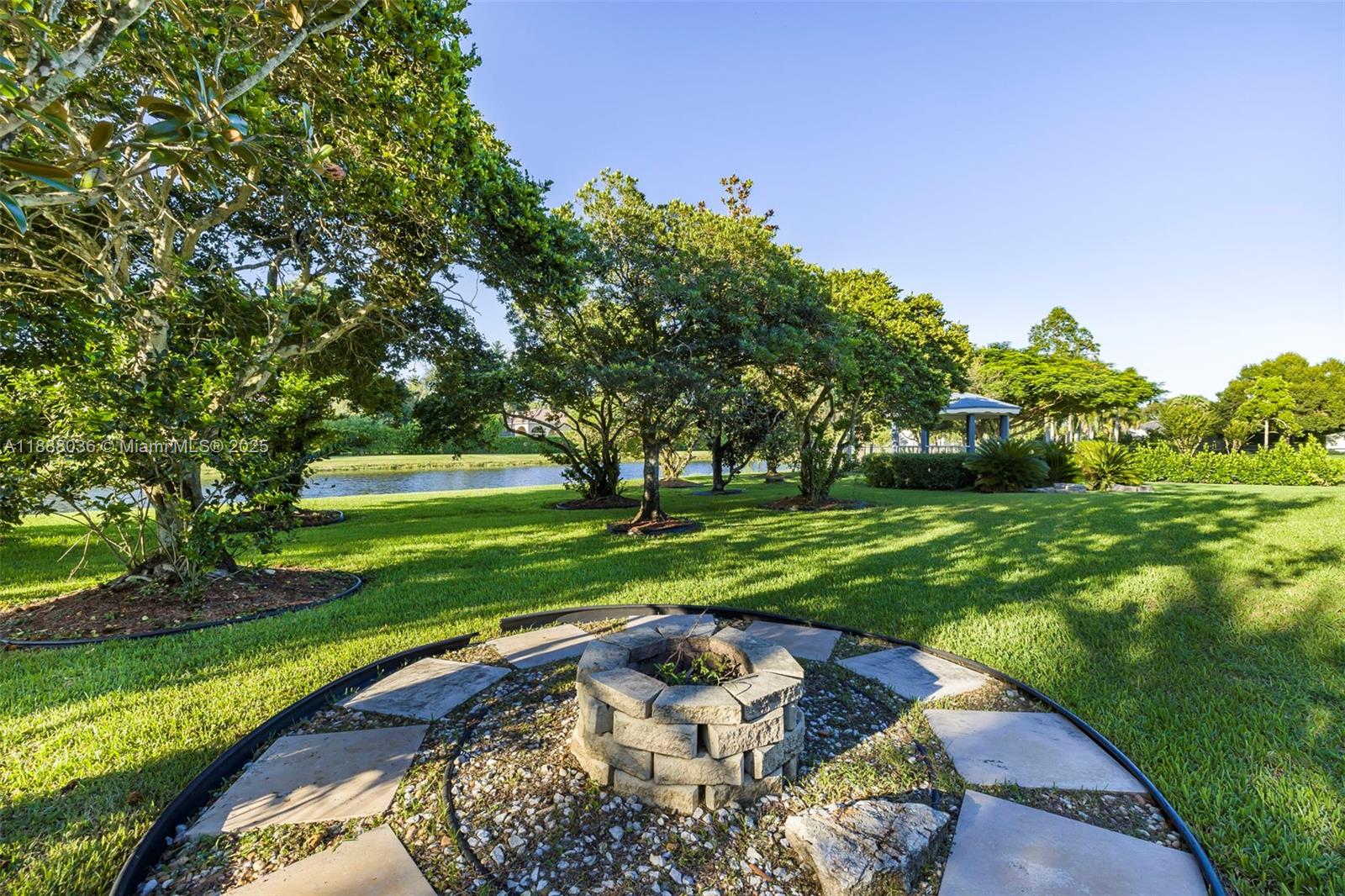 12555 Southwest 34th Place Davie, FL 33330 - Photo 31 of 73 a view of a golf course with a garden