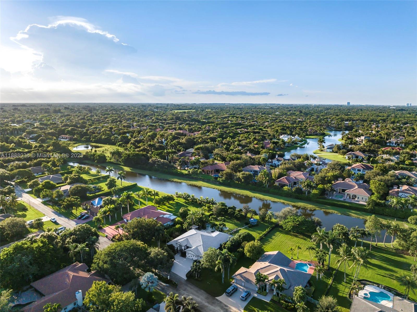 12555 Southwest 34th Place Davie, FL 33330 - Photo 34 of 73 an aerial view of a city with lots of residential buildings