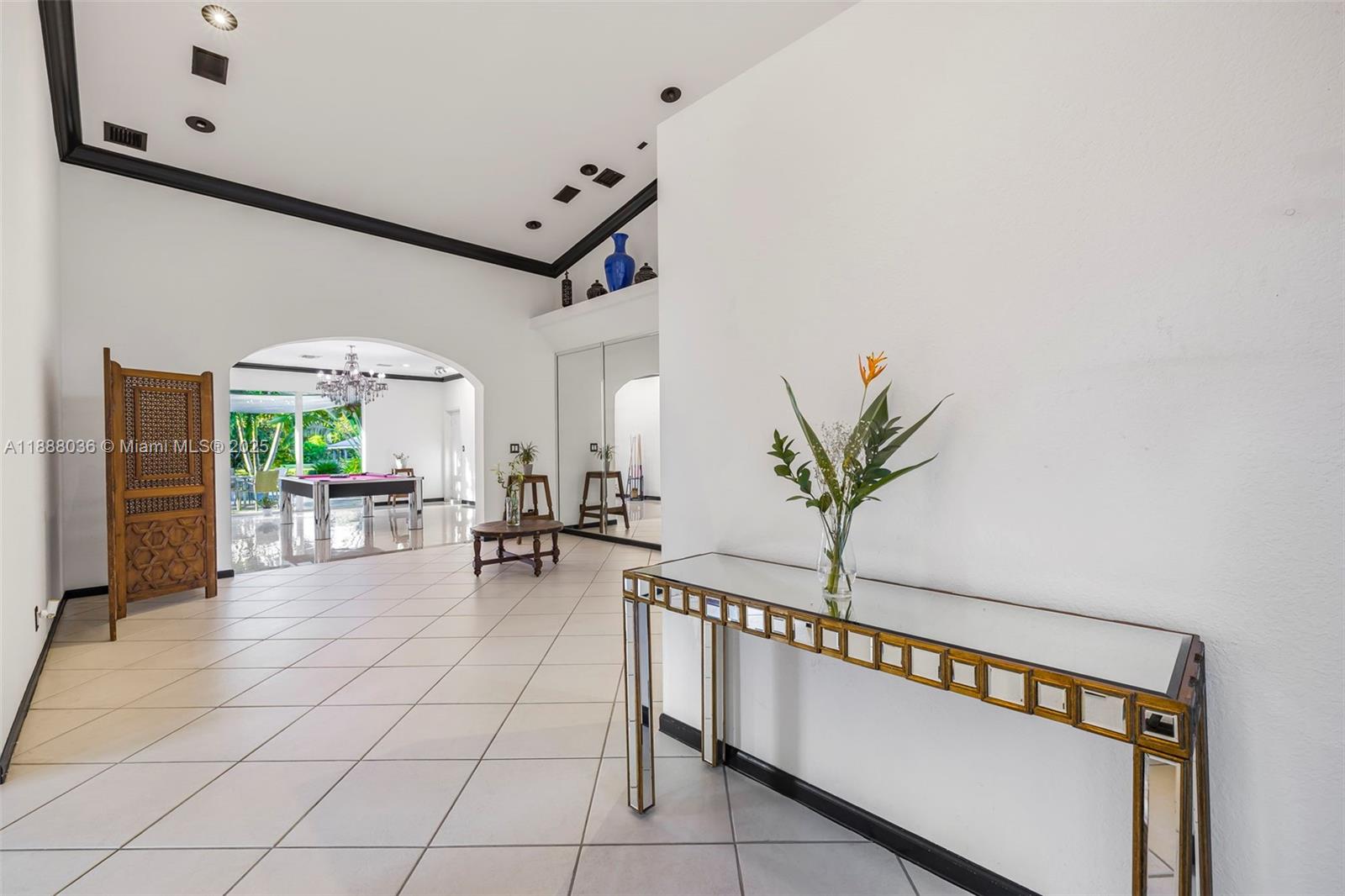 12555 Southwest 34th Place Davie, FL 33330 - Photo 43 of 73 a view of hall way with furniture and a potted plant