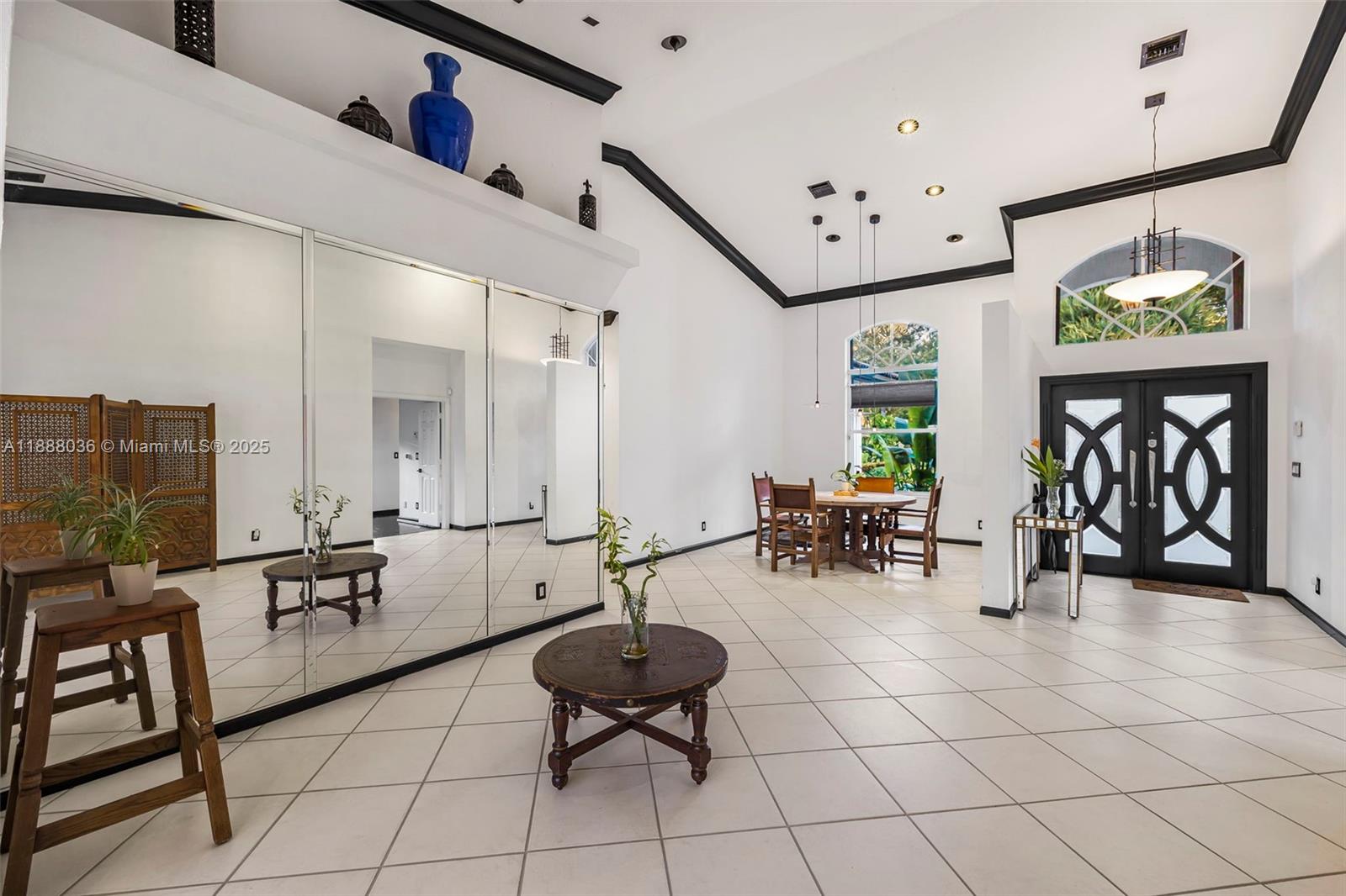 12555 Southwest 34th Place Davie, FL 33330 - Photo 45 of 73 a living room with furniture and white walls