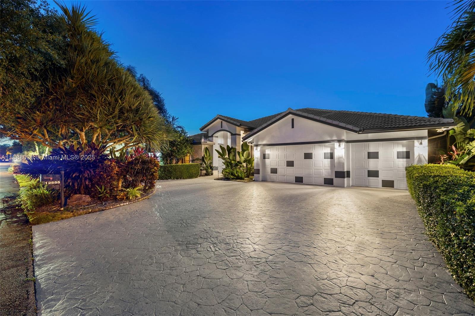 12555 Southwest 34th Place Davie, FL 33330 - Photo 5 of 73 a view of houses with outdoor space and parking