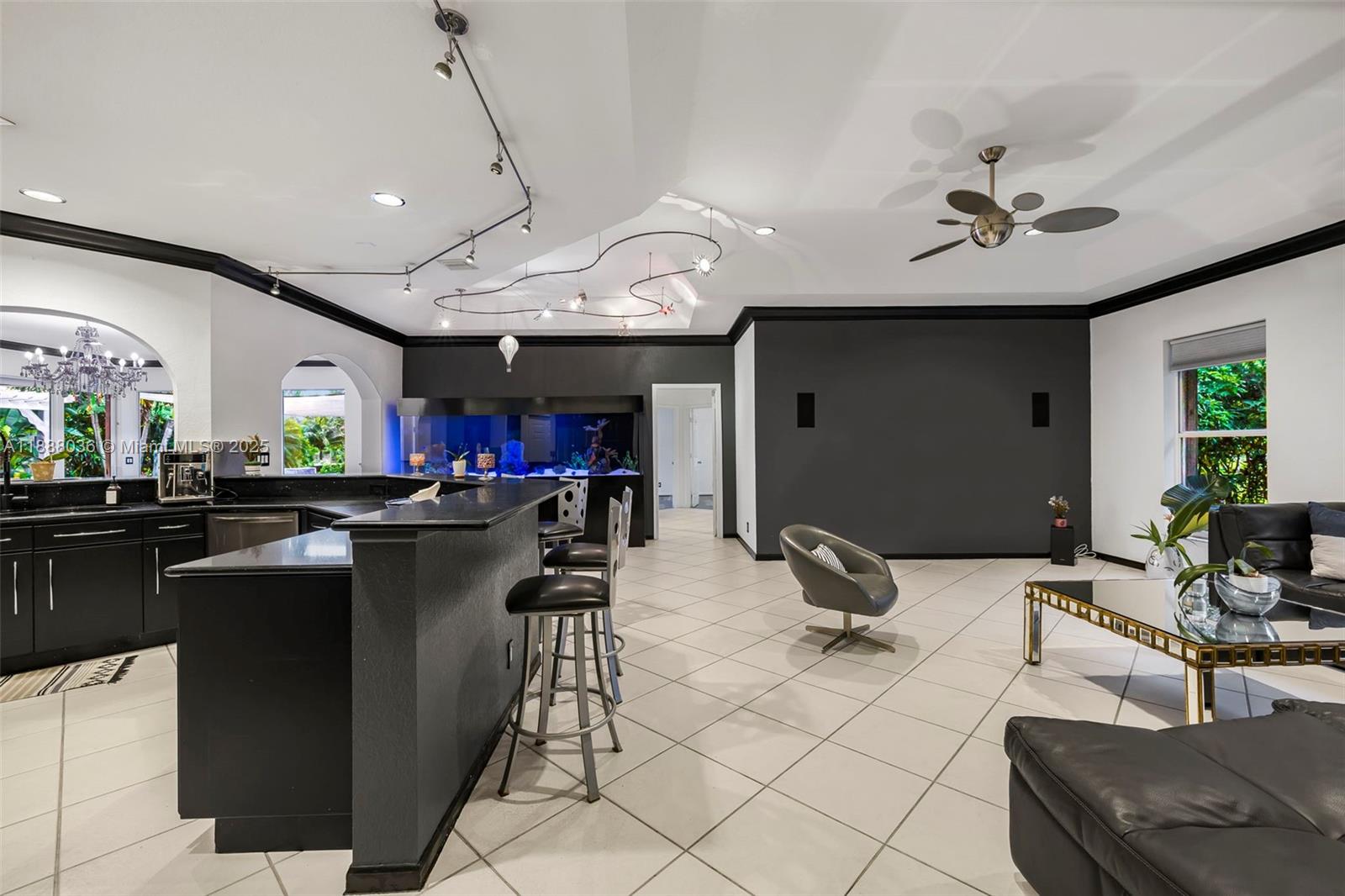 12555 Southwest 34th Place Davie, FL 33330 - Photo 60 of 73 a room with lots of chairs and mirrors