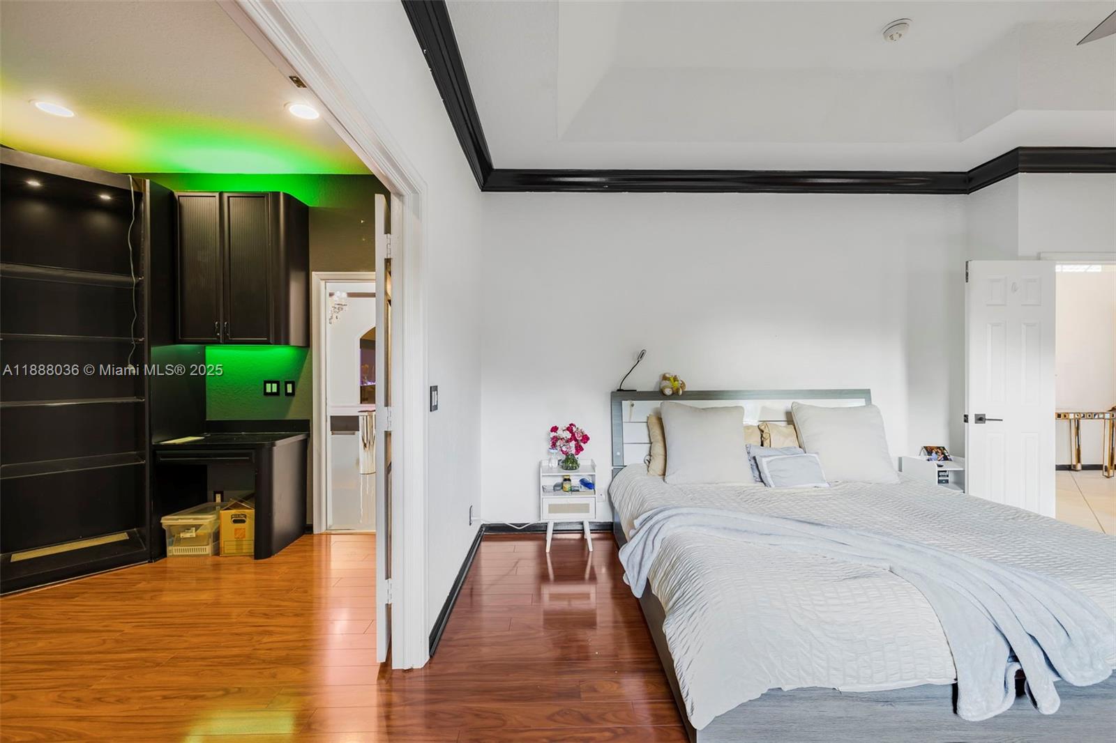 12555 Southwest 34th Place Davie, FL 33330 - Photo 65 of 73 a bed room with a bed and a potted plant