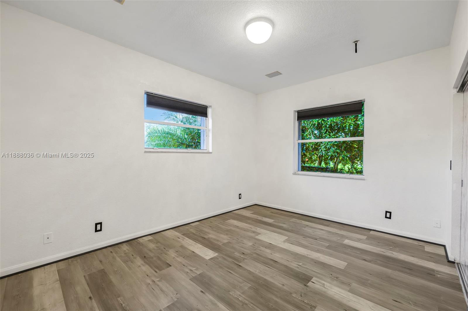 12555 Southwest 34th Place Davie, FL 33330 - Photo 72 of 73 an empty room with windows