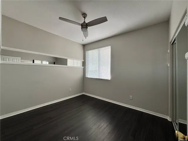a bathroom with a double vanity sink toilet and shower
