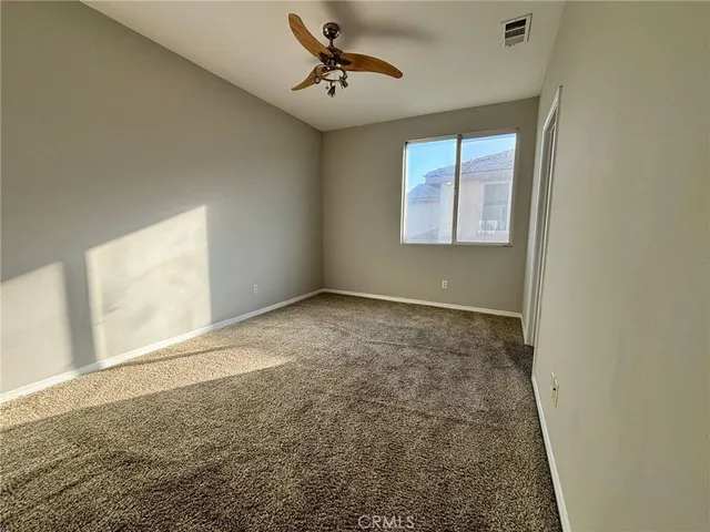 a view of a kitchen with a sink and a stove top oven