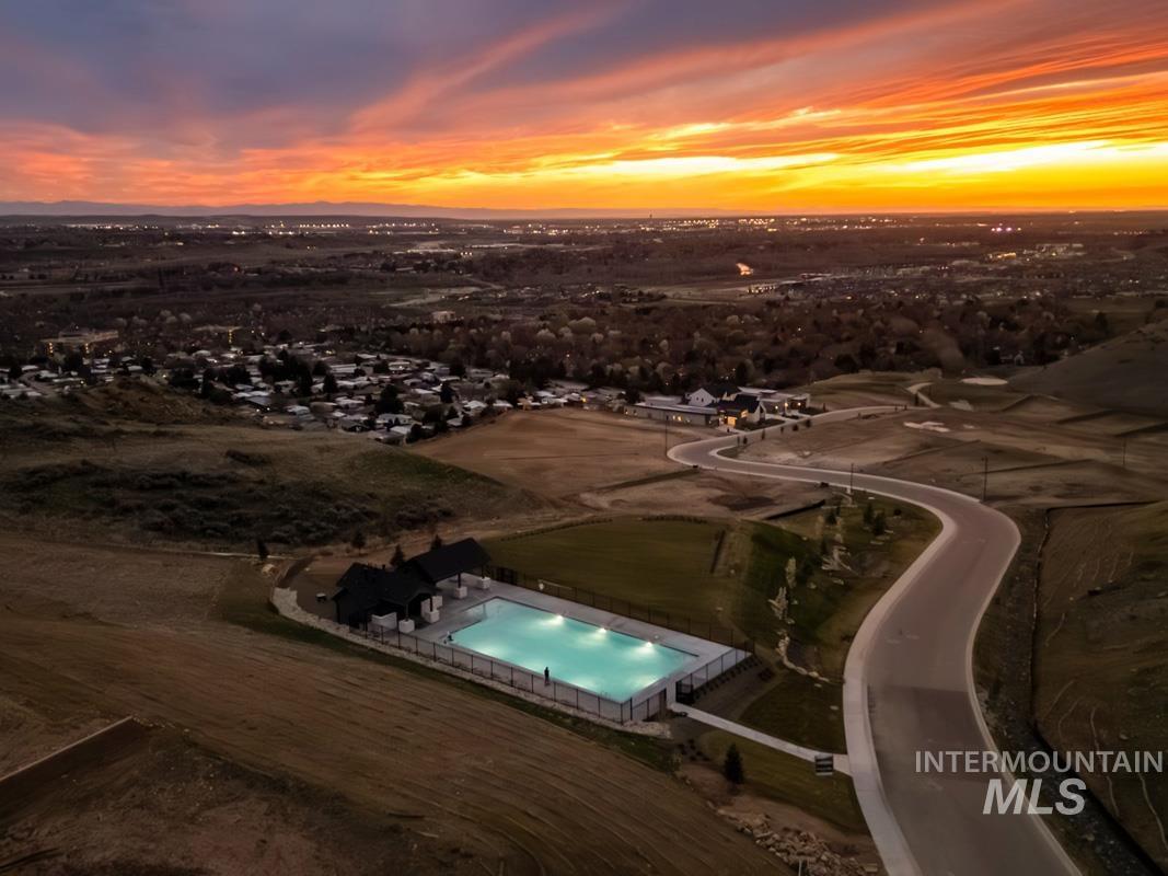 6169 East Prominence Court Boise, ID 83716 - Photo 36 of 43 Aerial view at dusk of view of pool area