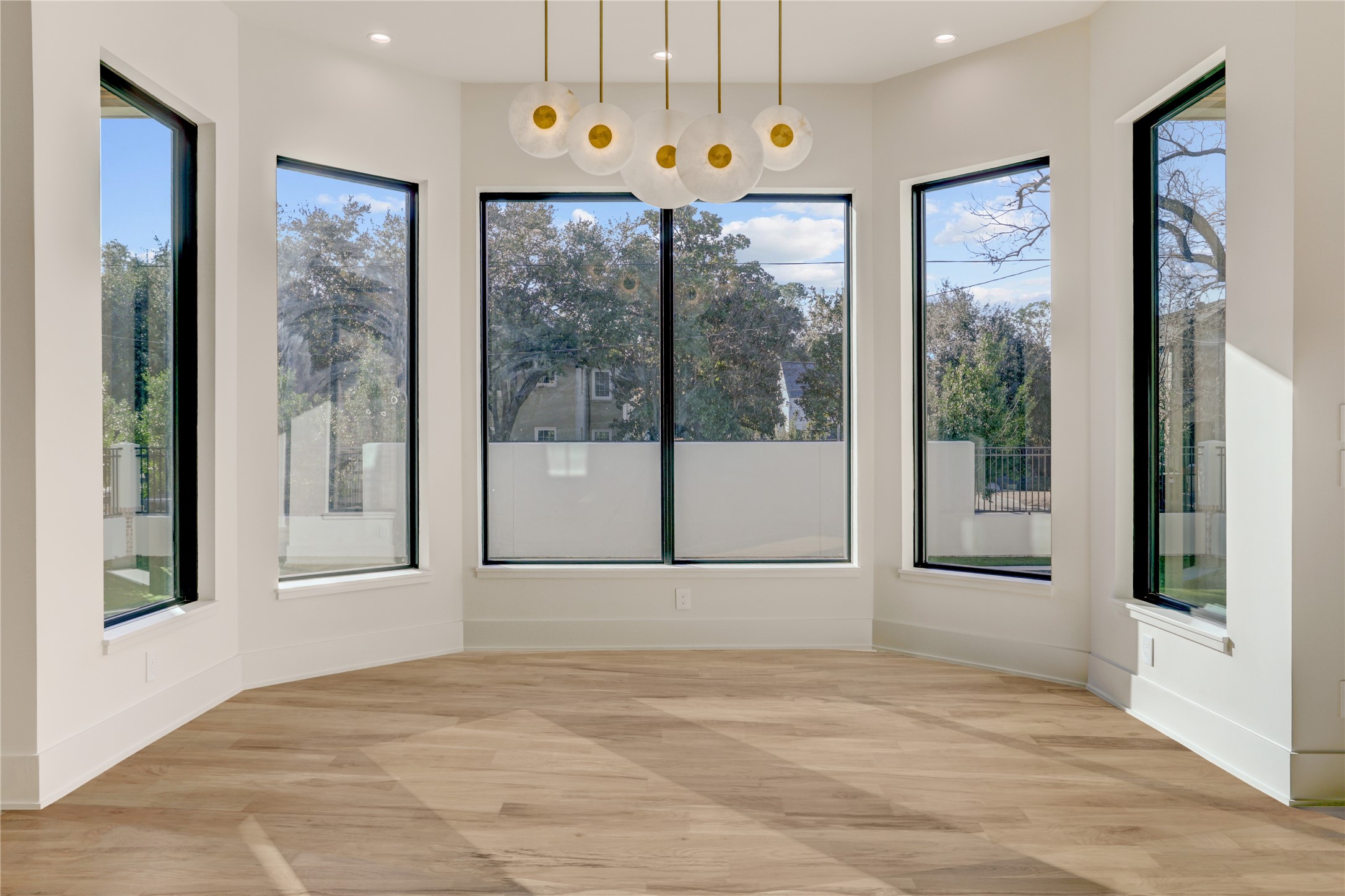 2250 Sunset Boulevard Houston, TX 77005 - Photo 11 of 40 Breakfast room is surrounded by windows with a view of the pool.