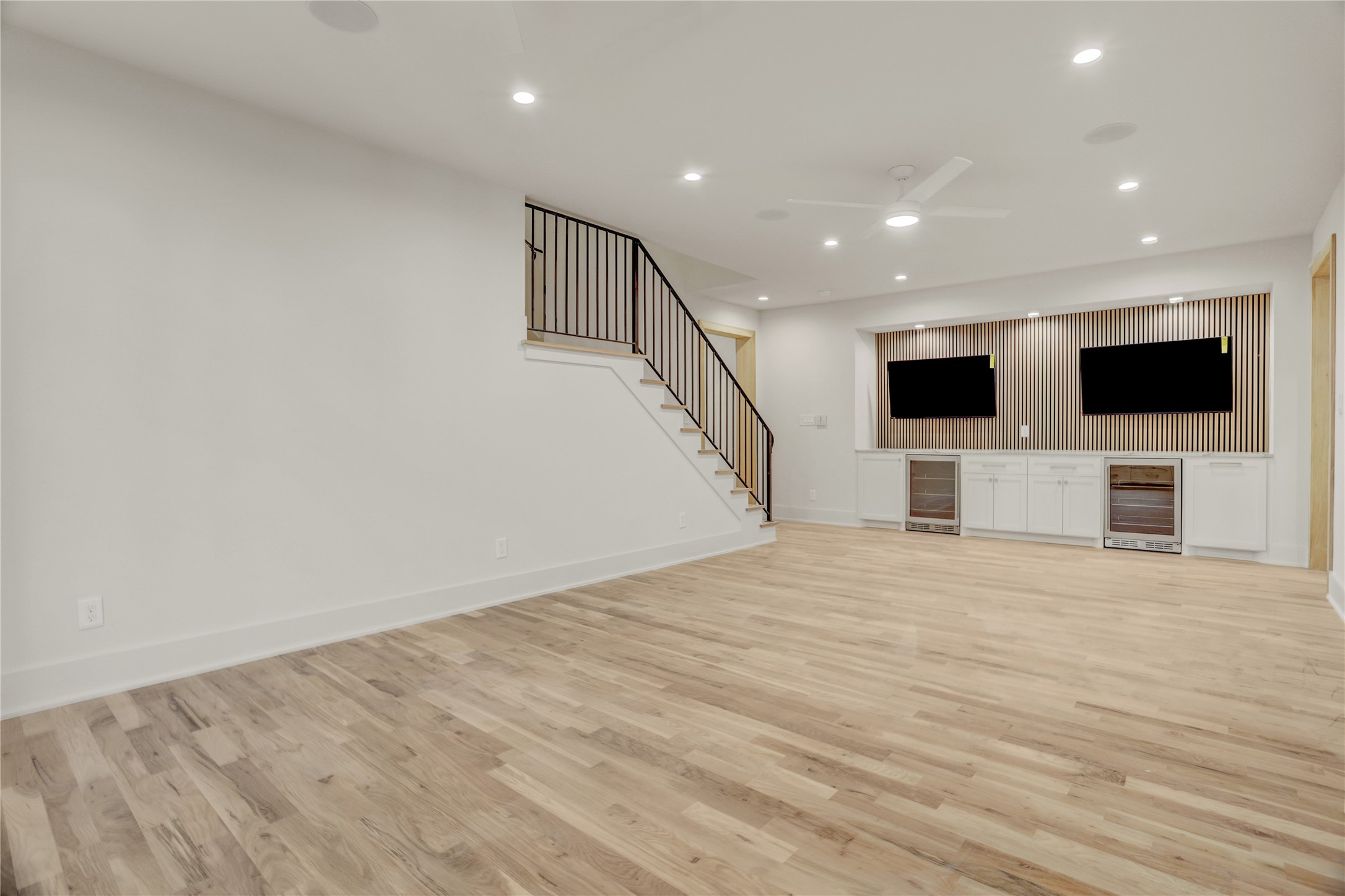 2250 Sunset Boulevard Houston, TX 77005 - Photo 29 of 40 The game room includes two large flat screen TV's for viewing multiple sports events at once and two beverage refrigerators/snack prep area.