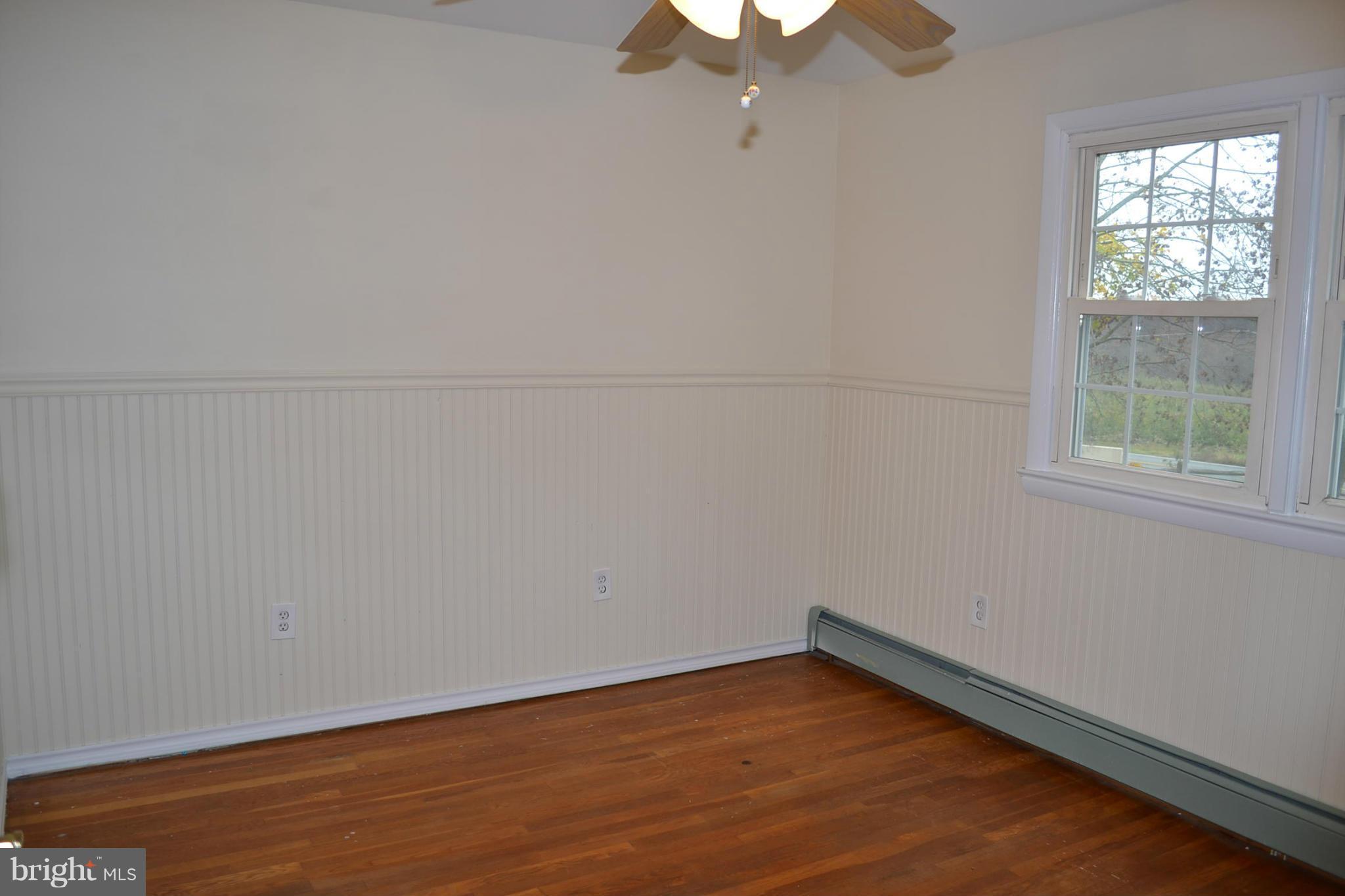 155 Brewster Bridge Road Elkton, MD 21921 - Photo 12 of 30 an empty room with a window