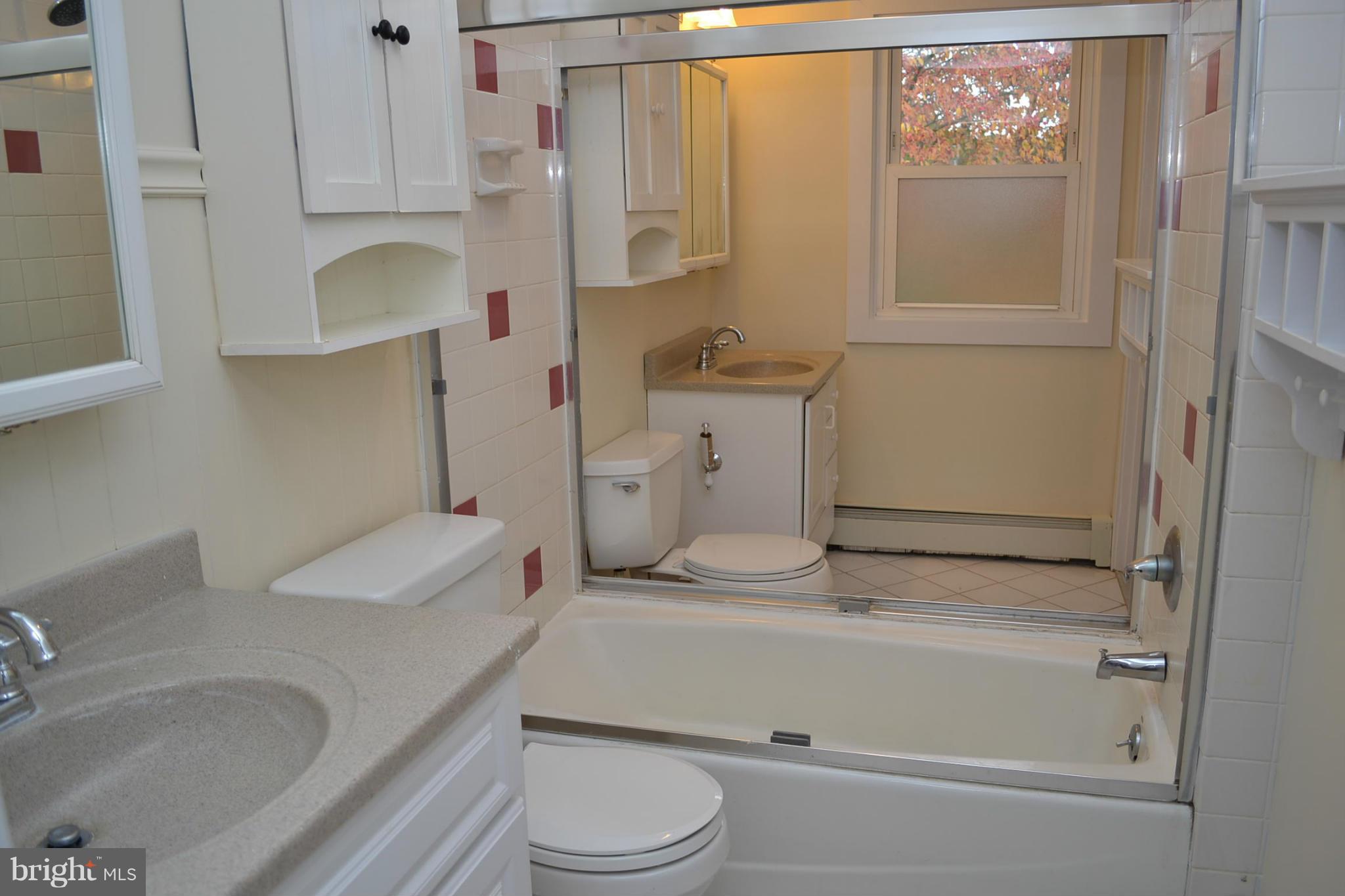 155 Brewster Bridge Road Elkton, MD 21921 - Photo 13 of 30 a bathroom with a sink toilet and shower