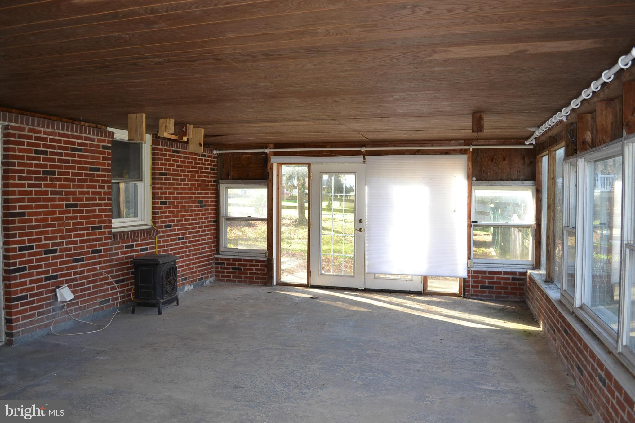 155 Brewster Bridge Road Elkton, MD 21921 - Photo 18 of 30 a view of an empty room with a window