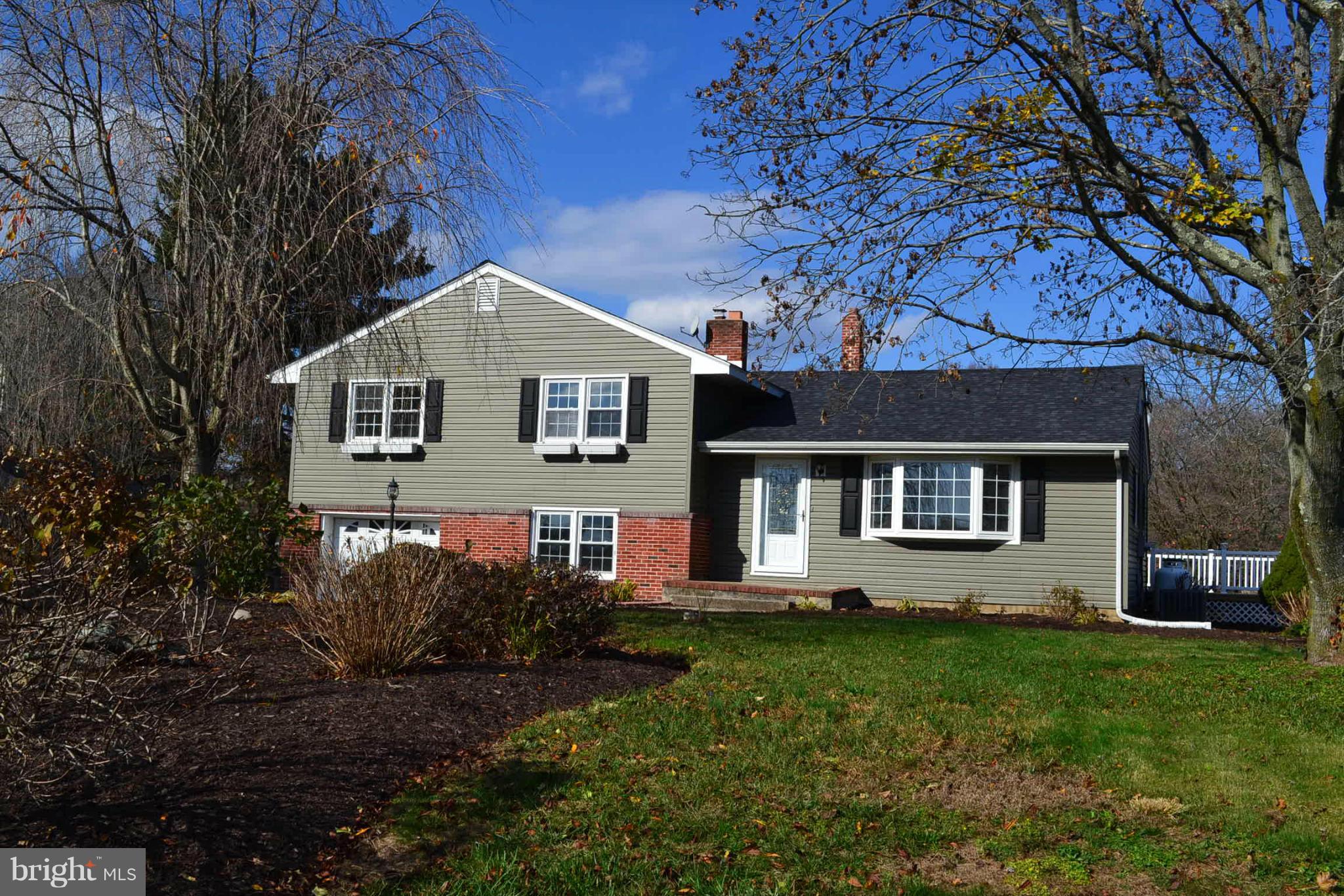 155 Brewster Bridge Road Elkton, MD 21921 - Photo 25 of 30 a front view of a house with a garden