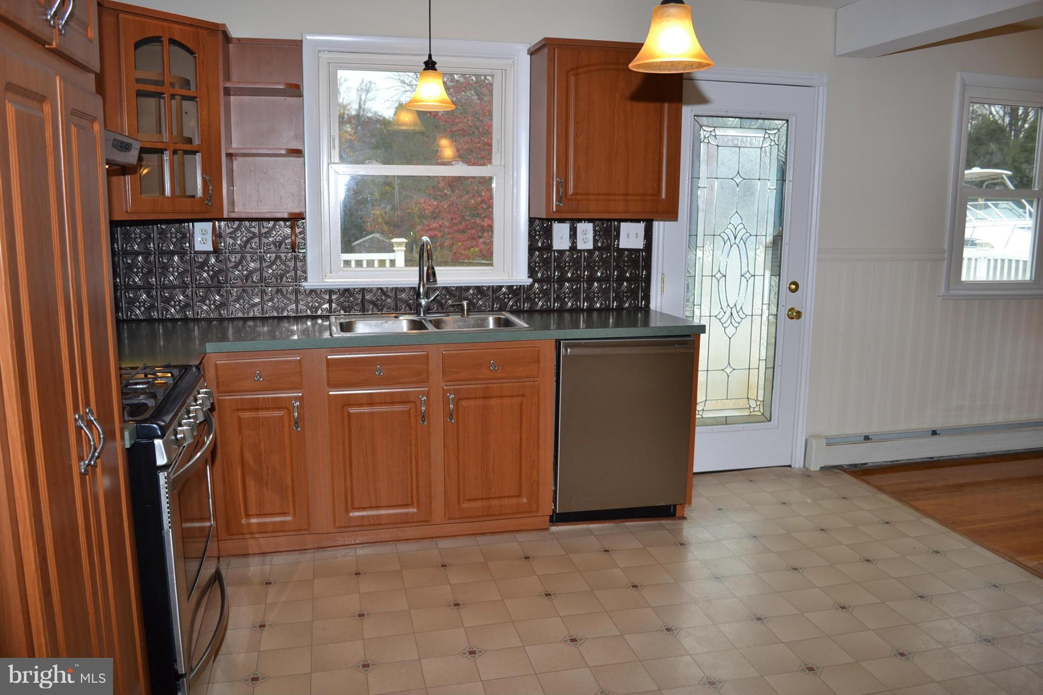 155 Brewster Bridge Road Elkton, MD 21921 - Photo 6 of 30 a view of cabinets and window