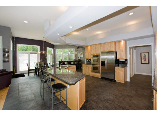 3511 Freeport Road Rockton, IL 61072 - Photo 2 of 10 a kitchen with refrigerator and chairs