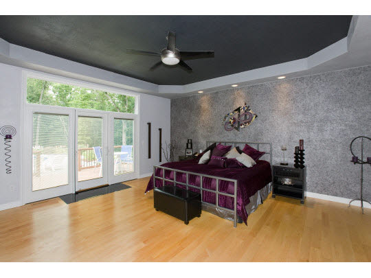3511 Freeport Road Rockton, IL 61072 - Photo 5 of 10 a bed room with a bed and a large window