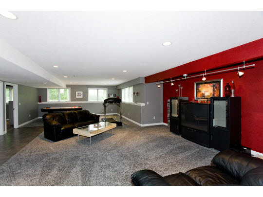 3511 Freeport Road Rockton, IL 61072 - Photo 6 of 10 a living room with furniture and a flat screen tv