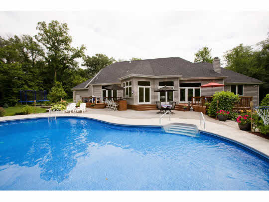 3511 Freeport Road Rockton, IL 61072 - Photo 8 of 10 a house view with swimming pool and chairs
