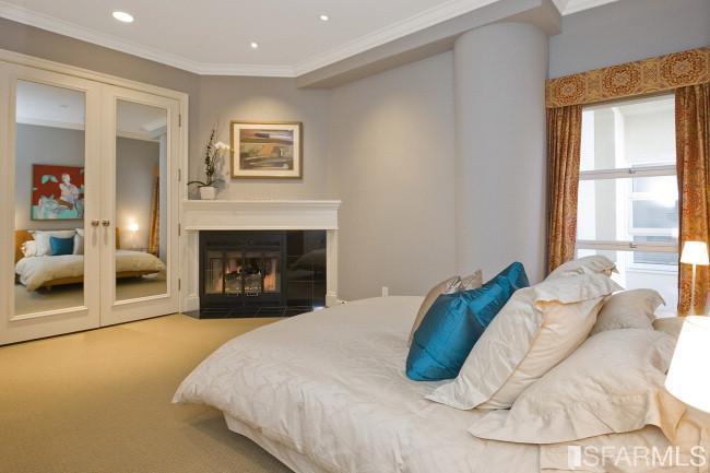 2139 Green, Unit E San Francisco, CA 94123 - Photo 12 of 18 View of Master bedroom with gas fireplace, custom closets and ensuite master bathroom.