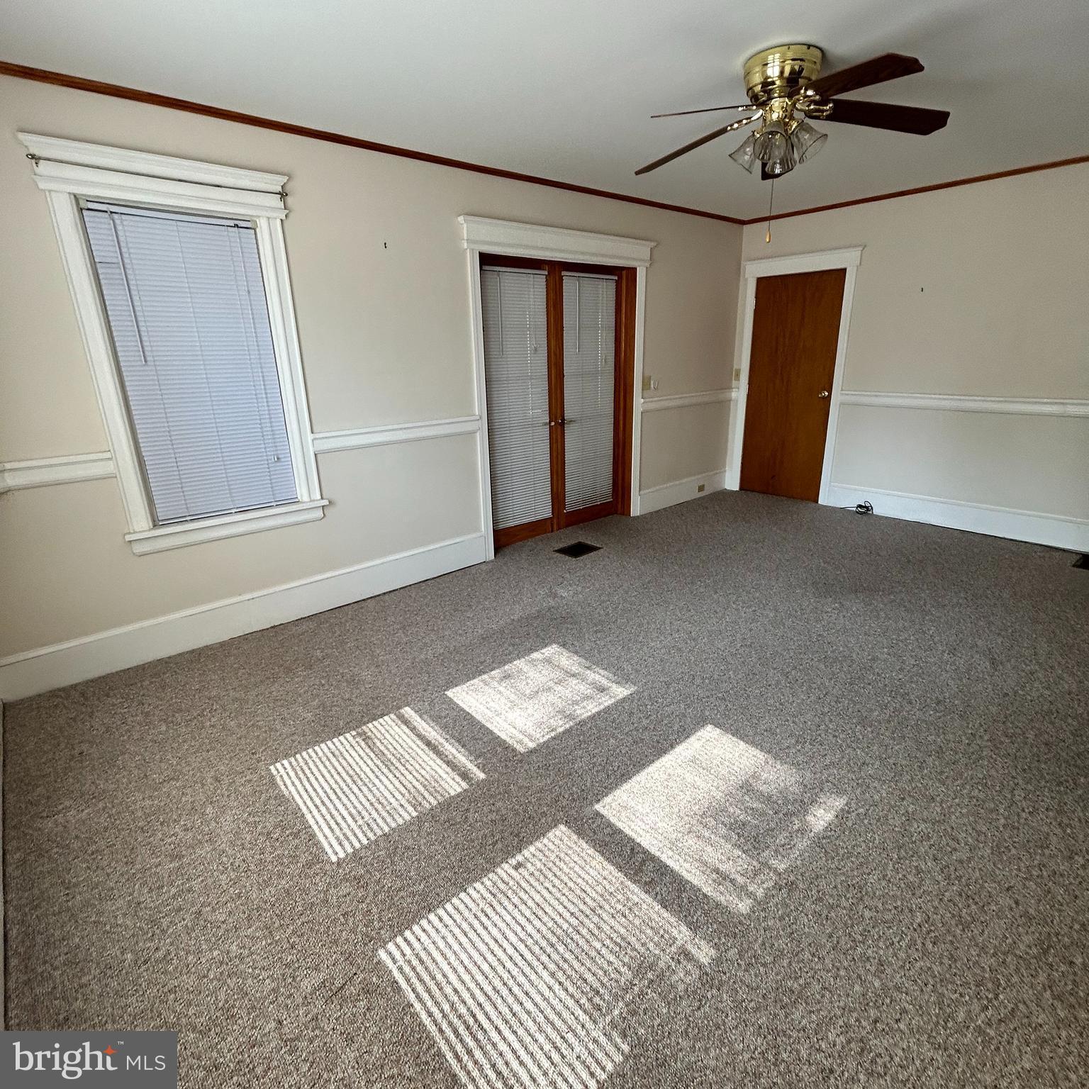 1735 Nottingham Way, Unit 1 1 Hamilton, NJ 08619 - Photo 4 of 14 Living room with doors toward porch