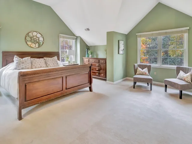 a living room with furniture and a gate