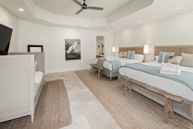 a bathroom with a sink toilet and mirror