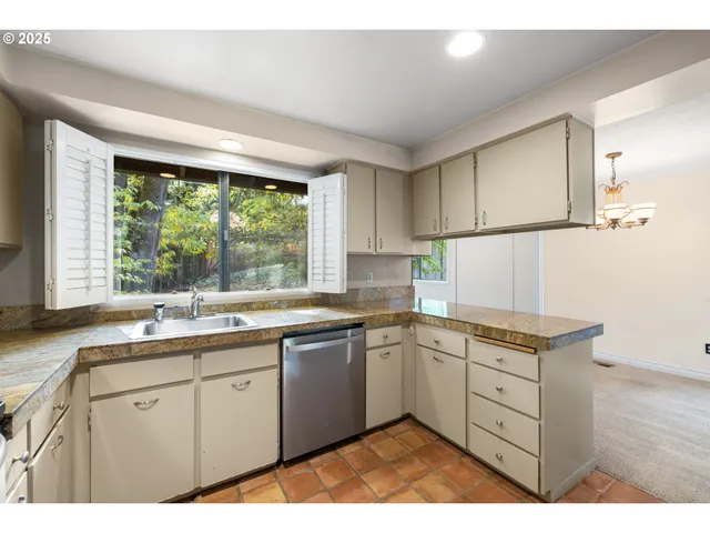 a bathroom with a sink a vanity and a mirror