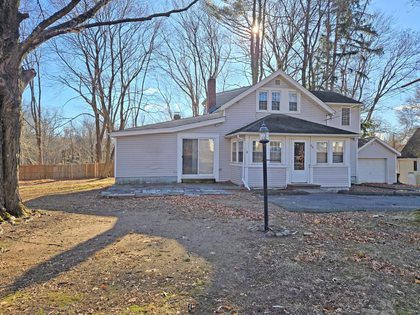 66 Upper State Street North Haven, CT 06473 - Photo 1 of 1 a front view of a house with a garden