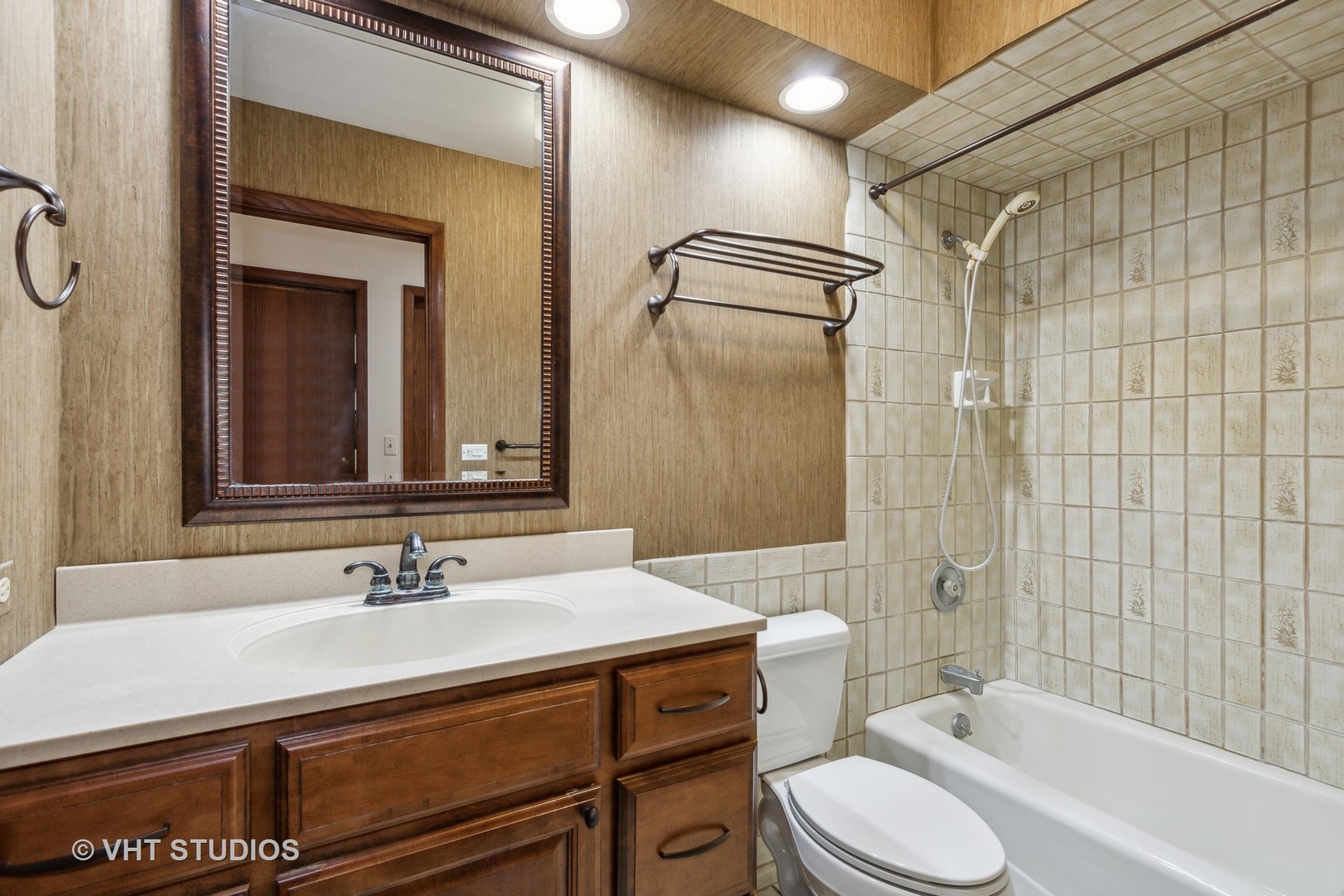 243 Butternut Road Barrington Hills, IL 60010 - Photo 21 of 56 a bathroom with a sink toilet vanity and shower