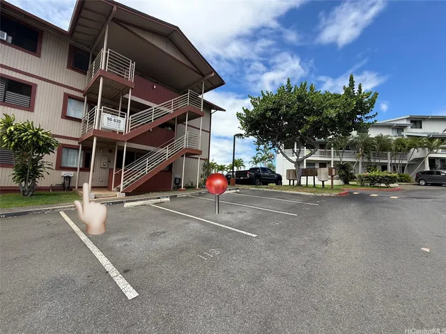 a view of a building with a street