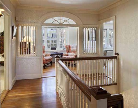 2 Lakeview Road Winchester, MA 01890 - Photo 9 of 11 a view of a hallway with wooden floor and stairs
