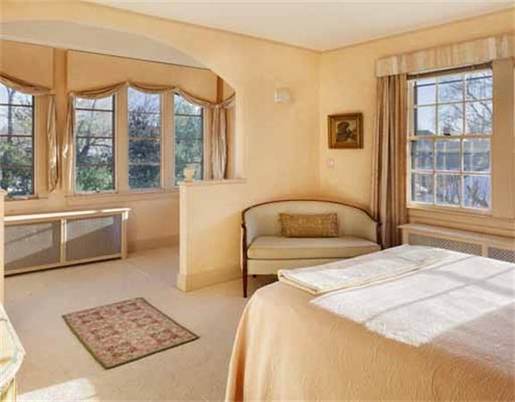 2 Lakeview Road Winchester, MA 01890 - Photo 10 of 11 a bedroom with a large bed and a couch
