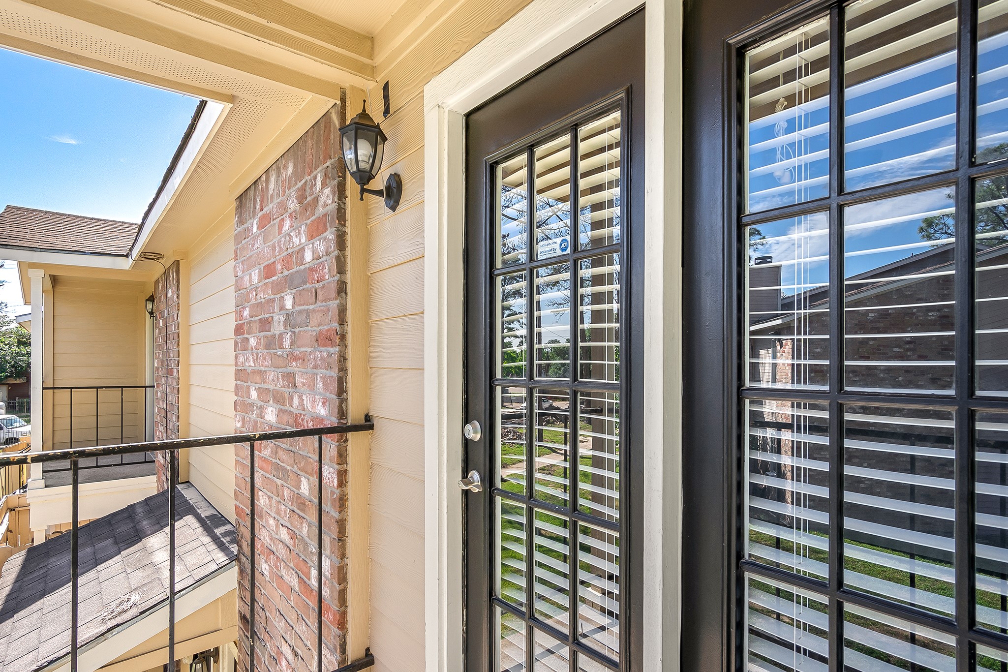 7402 Alabonson Road, Unit 510 Houston, TX 77088 - Photo 14 of 14 a view of balcony with window