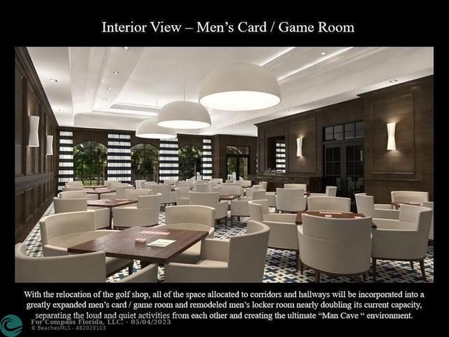 a view of a dining hall with lots of tables and chairs