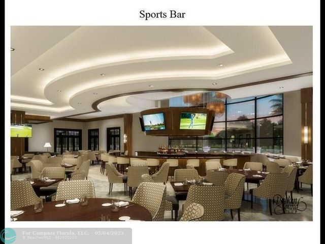 a backyard of a house with table and chairs potted plants