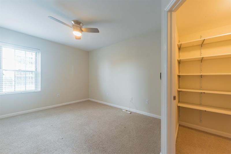 199 14th Street Northeast, Unit 705 Atlanta, GA 30309 - Photo 13 of 20 an empty room with a window
