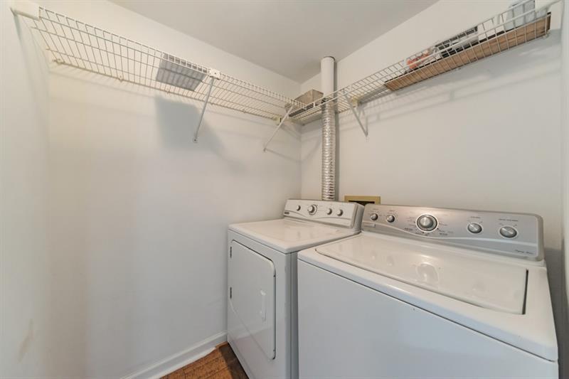 199 14th Street Northeast, Unit 705 Atlanta, GA 30309 - Photo 18 of 20 a utility room with dryer and washer