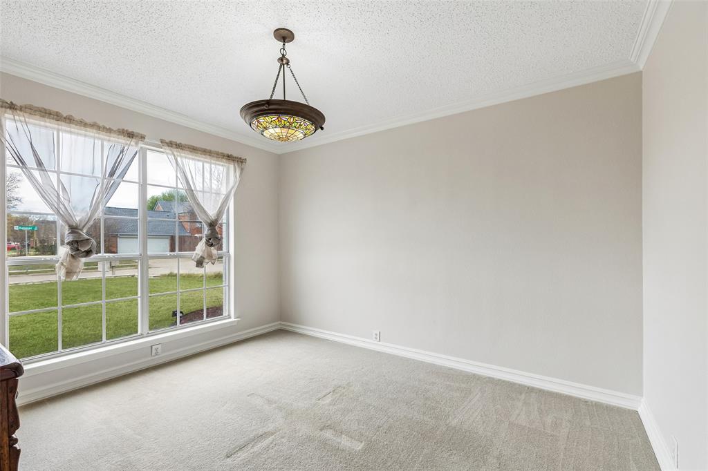 133 Hanover Street Grand Prairie, TX 75052 - Photo 15 of 31 a view of a room with a large window