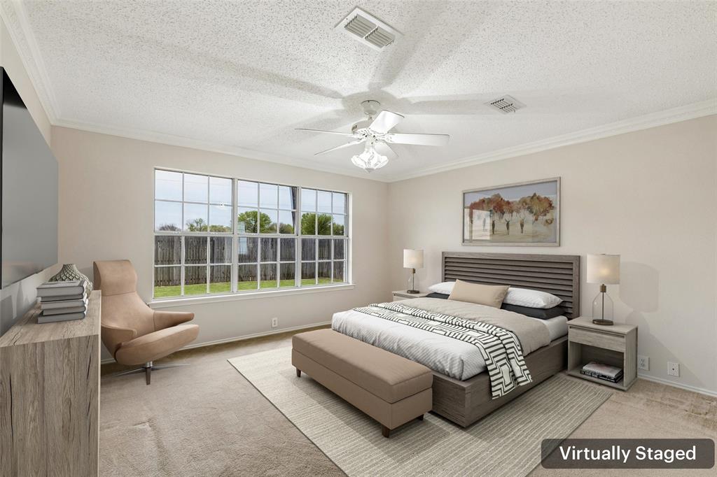 133 Hanover Street Grand Prairie, TX 75052 - Photo 16 of 31 a bedroom with a bed and a couch