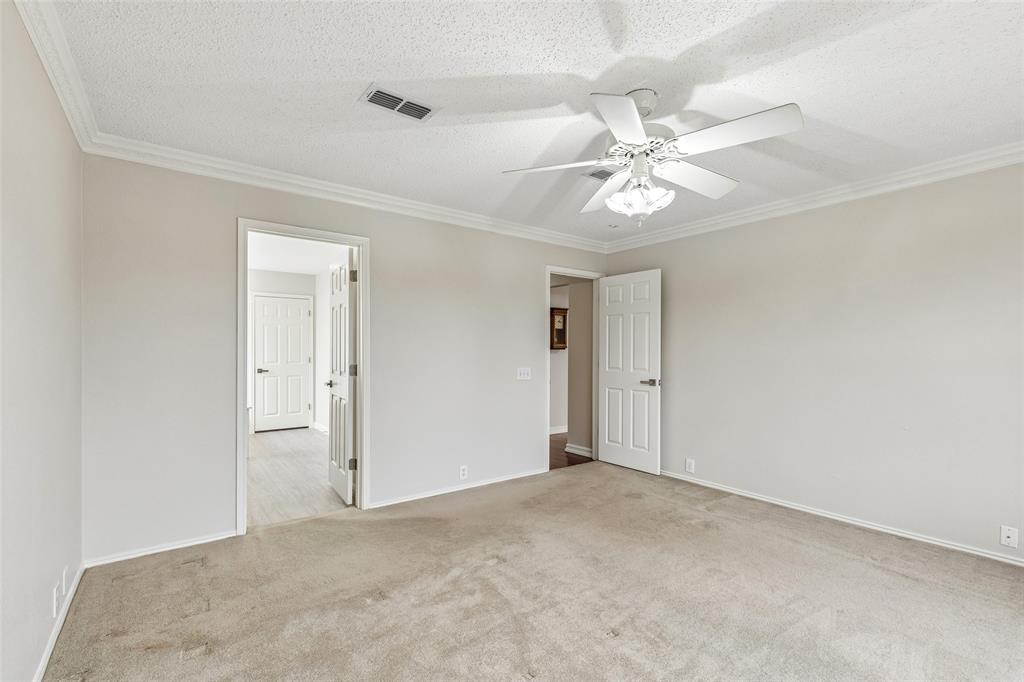 133 Hanover Street Grand Prairie, TX 75052 - Photo 19 of 31 a view of an empty room and chandelier fan