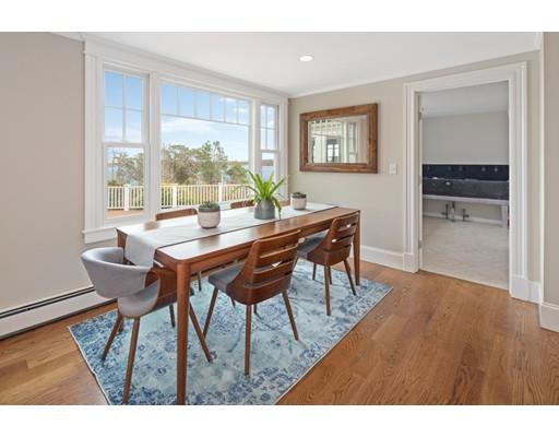 62 White Head Road Cohasset, MA 02025 - Photo 11 of 30 a dining room with furniture and wooden floor