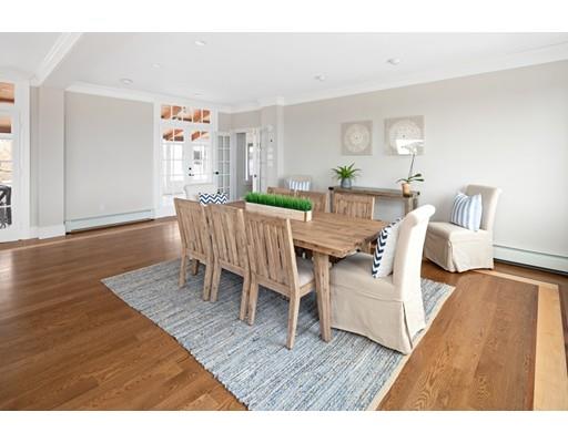 62 White Head Road Cohasset, MA 02025 - Photo 14 of 30 a view of a dining room with furniture and wooden floor
