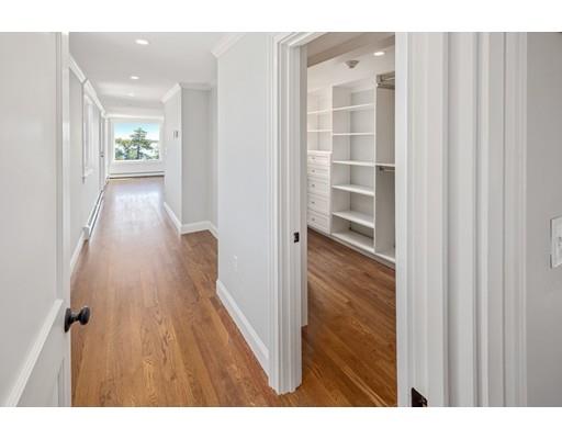 62 White Head Road Cohasset, MA 02025 - Photo 15 of 30 a view of a hallway with wooden floor and staircase