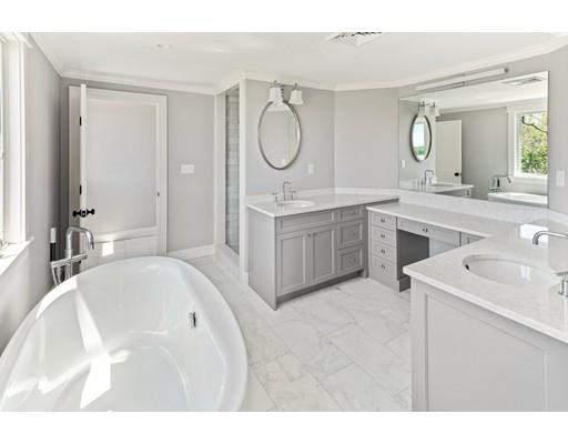 62 White Head Road Cohasset, MA 02025 - Photo 19 of 30 a spacious bathroom with a sink double vanity and a mirror