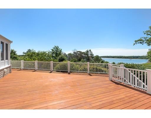 62 White Head Road Cohasset, MA 02025 - Photo 29 of 30 a view of a terrace with wooden floor and fence