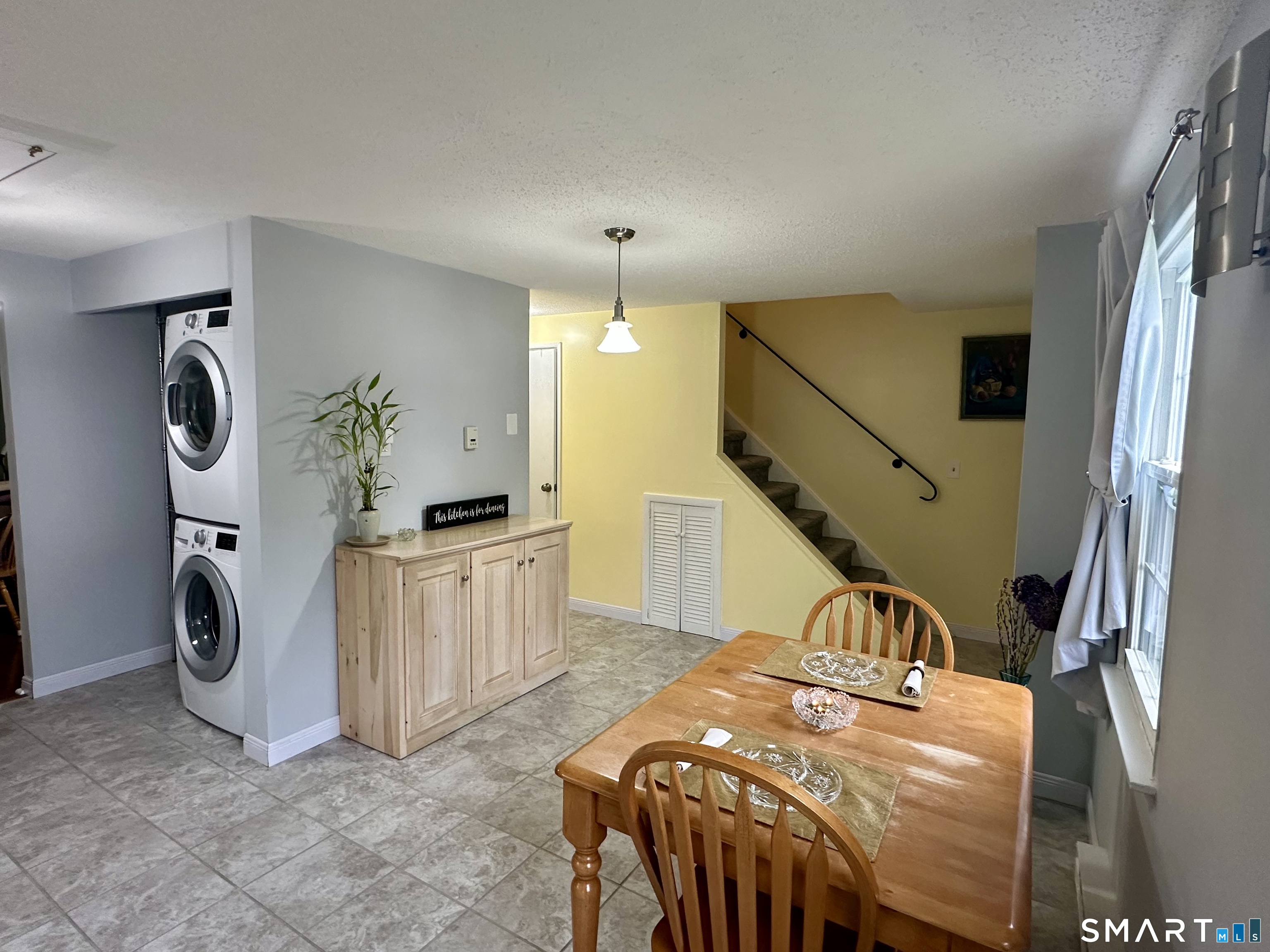 2 Lakeside Drive, Unit M Ledyard, CT 06339 - Photo 7 of 38 a view of living room kitchen and entryway