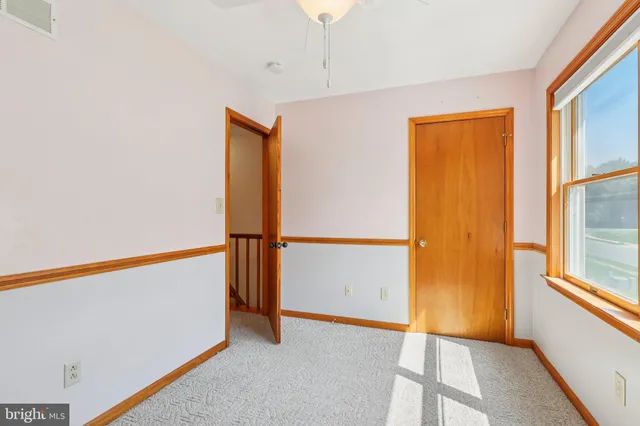 a view of an empty room with window