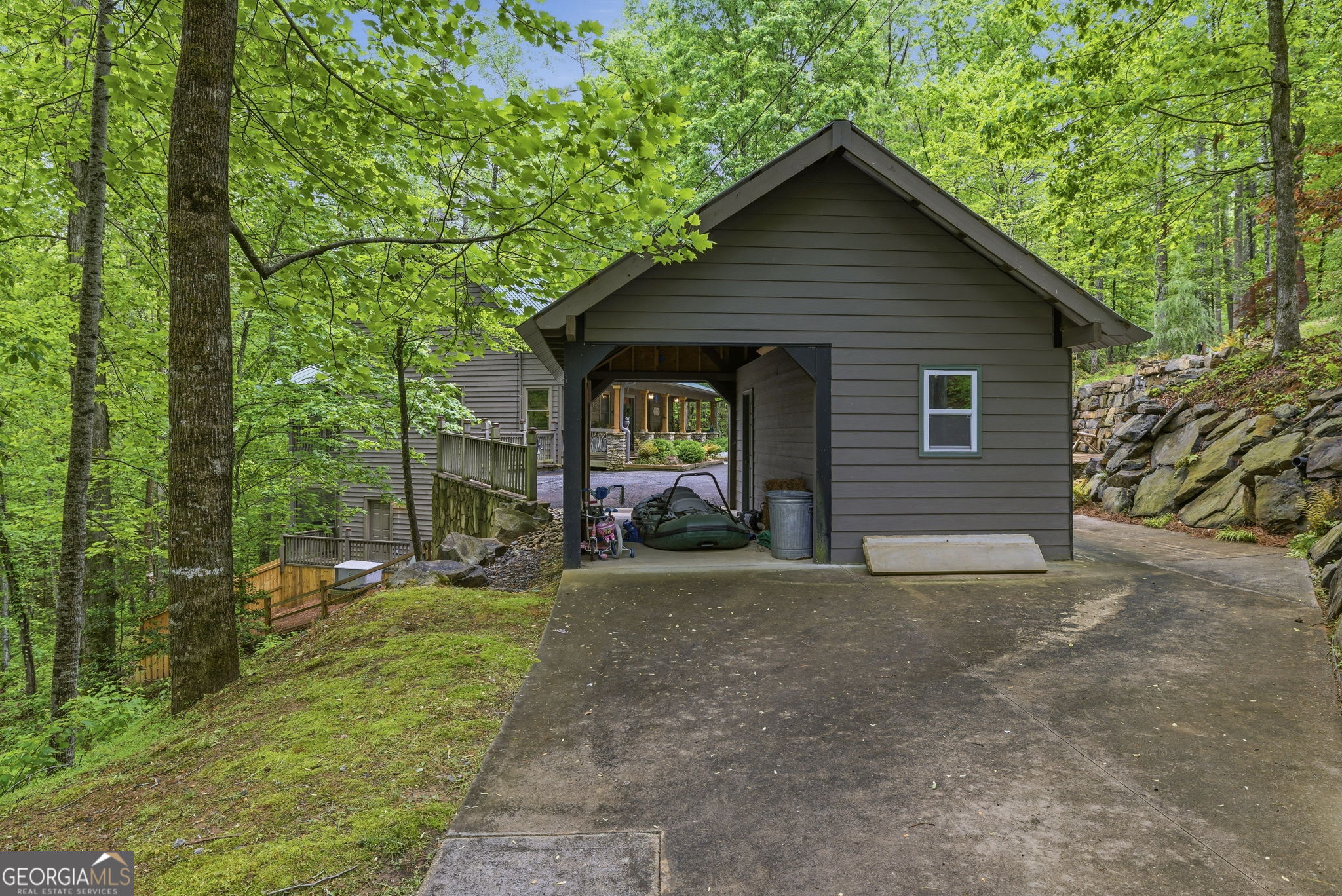 634 Little Hawk Road Sautee Nacoochee, GA 30571 - Photo 50 of 54 a view of a house with a yard