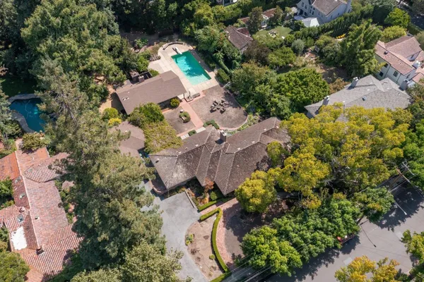 an aerial view of residential house with outdoor space